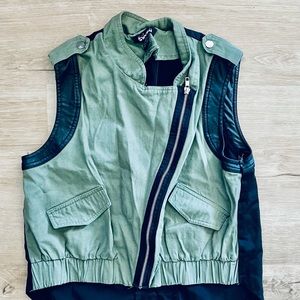 Sleeveless zip up top